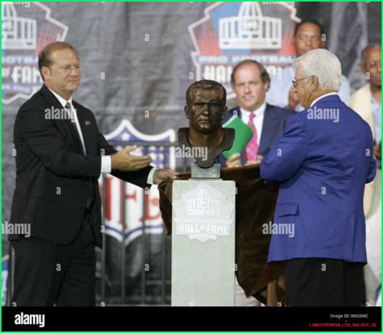Bobby Brown's Son Strikes a Pose in Pink Suit beside Parents & Sisters on His Graduation Day